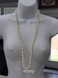 ANTIQUE ANGEL SKIN CORAL BEADED NECKLACE. 8.7MM WIDE. 30 LONG. 87.3 Grams