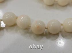 ANTIQUE ANGEL SKIN CORAL BEADED NECKLACE. 8.7MM WIDE. 30 LONG. 87.3 Grams