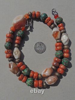A necklace with ancient agate old undyed coral venetian and hill tribe beads #21
