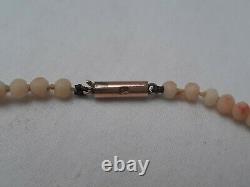 Antique Edwardian natural coral bead necklace with 9ct gold clasp