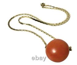 Art deco gold necklace with large natural coral bead