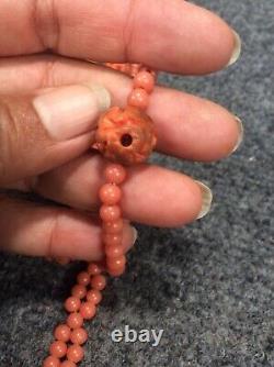As is vintage Chinese carved salmon coral necklace