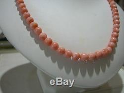 Beautiful Vintage 7.5mm Coral Bead Necklace 18 inches with 14 karat Gold Clasp