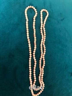 Beautiful genuine salmon coral bead rope style necklace from estate