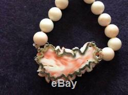 Vintage 32 Opera Length Sterling Carved Angel Skin Coral Necklace 10 mm Beads