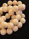 Vintage Angel Skin Carved Coral Chinese Shou Bead Necklace